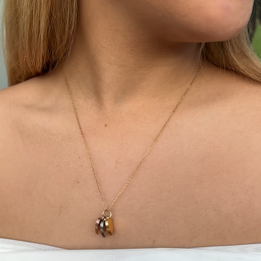 Dainty necklace with gold, silver and rose gold hearts