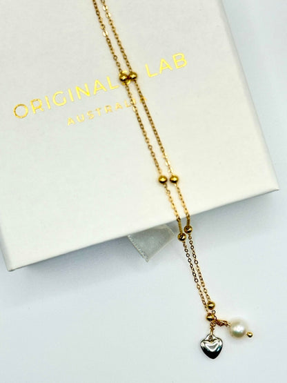 Satellite chain necklace with natural pearl and heart charm