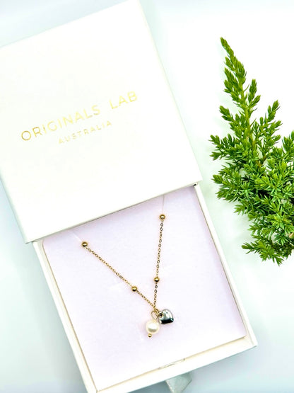 Satellite chain necklace with natural pearl and heart charm